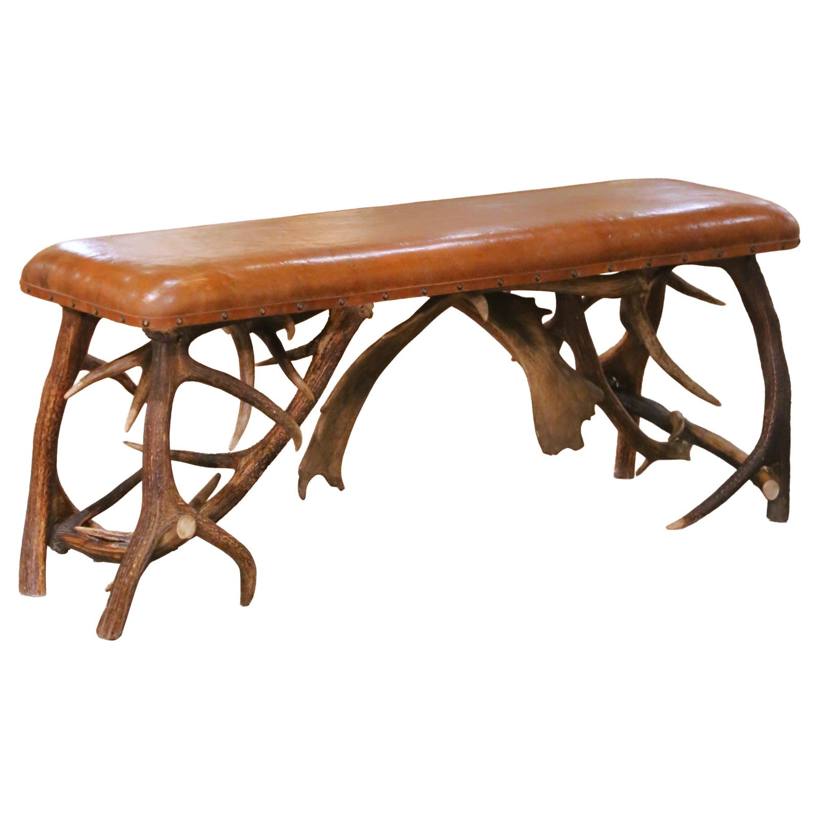 Austrian Black Forest Antler and Leather Alpine Bench Circa 1930: Austrian Black Forest Antler and Leather Alpine Bench Circa 1930 This early 20th century Austrian Black Forest bench features a sculptural base crafted from naturally shed deer antlers, hand-assembled