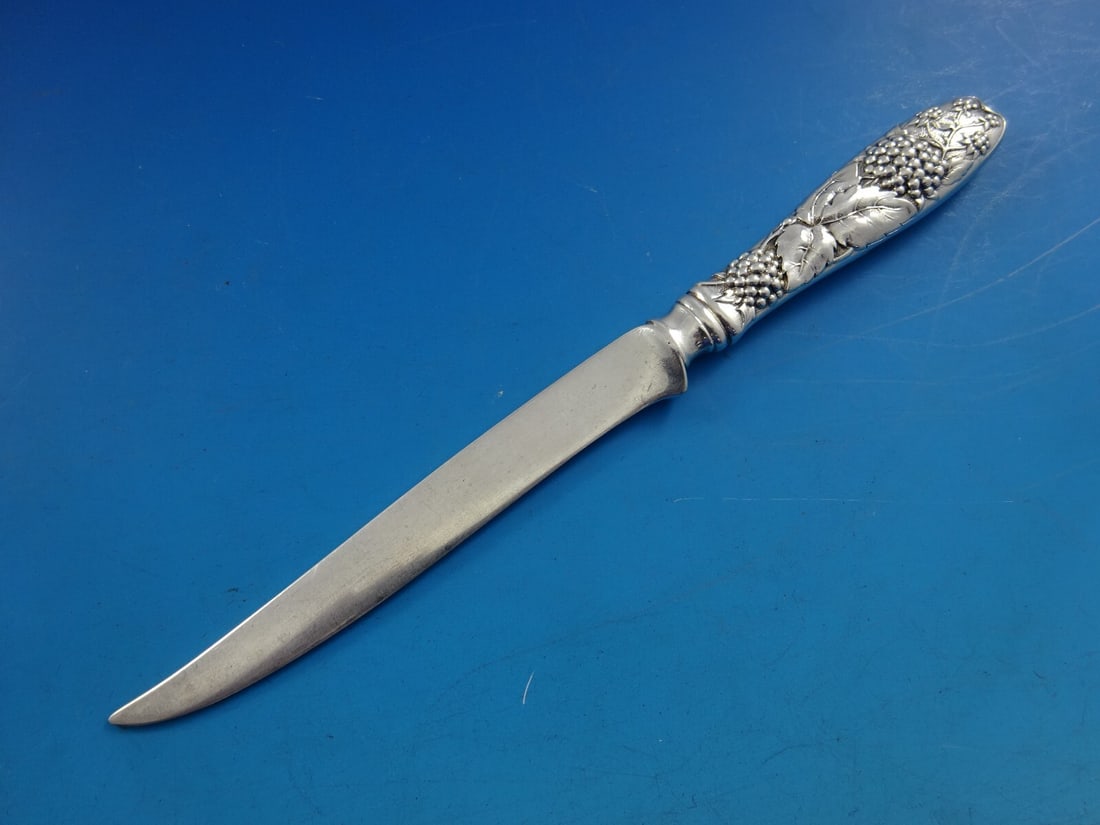 Tiffany & Co. Blackberry Sterling Silver Fruit Knife 7 1/4" Monogrammed: Tiffany & Co. Blackberry Sterling Silver Fruit Knife 7 1/4" Monogrammed Discover a rare find with this exquisite Blackberry pattern fruit knife by Tiffany & Co. Crafted from high-quality sterling silv