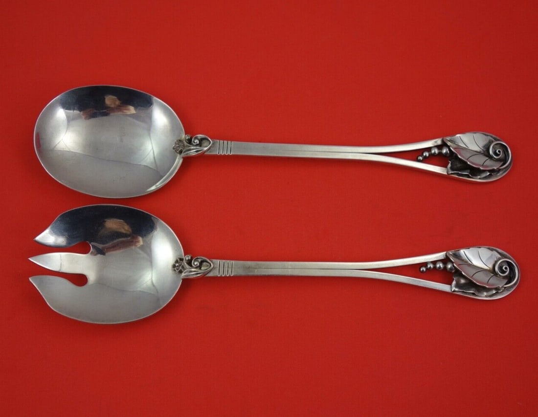 Georg Jensen Ornamental #113 Sterling Silver Salad Serving Set 2pc: Georg Jensen Ornamental #113 Sterling Silver Salad Serving Set 2pc Enhance your dining experience with this exquisite 2-piece salad serving set from Georg Jensen, featuring the elegant Ornamental #113