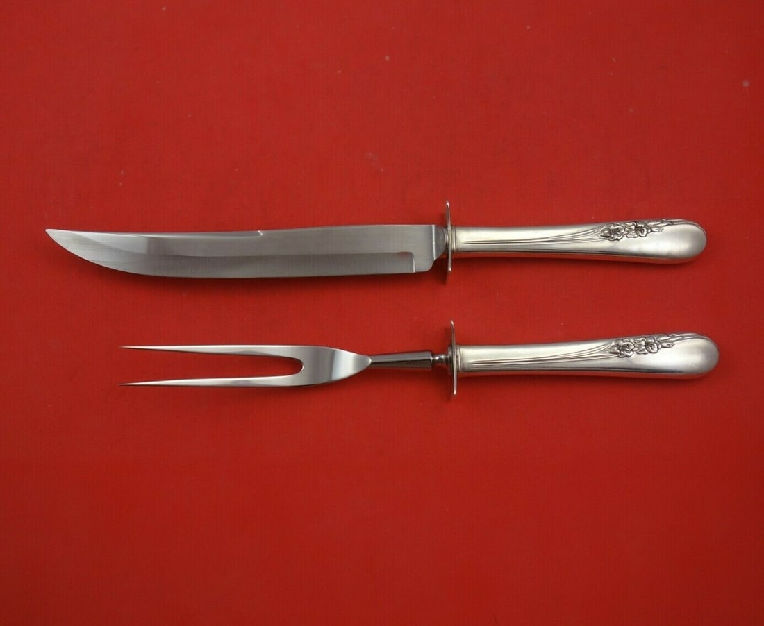 International Blossom Time Sterling Silver 2pc Steak Carving Set: International Blossom Time Sterling Silver 2pc Steak Carving Set Enhance your dining experience with this elegant 2-piece steak carving set from the Blossom Time pattern by International Sterling. Cra
