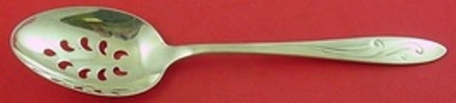 Towle Awakening Sterling Silver Slotted Serving Spoon 9-Hole 8.5": Towle Awakening Sterling Silver Slotted Serving Spoon 9-Hole 8.5" This exquisite slotted serving spoon from Towle features a beautiful pierced design with 9 holes, perfect for draining liquids while s