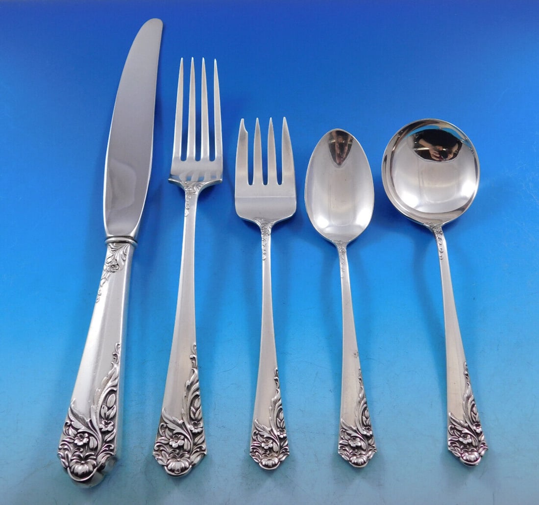 Amston Ecstasy Sterling Silver Flatware Set for 8, 40 Pieces with Storage Chest: Amston Ecstasy Sterling Silver Flatware Set for 8, 40 Pieces with Storage Chest This exquisite Ecstasy flatware set by Amston Silver is perfect for elegant dining occasions, featuring a stunning sweep