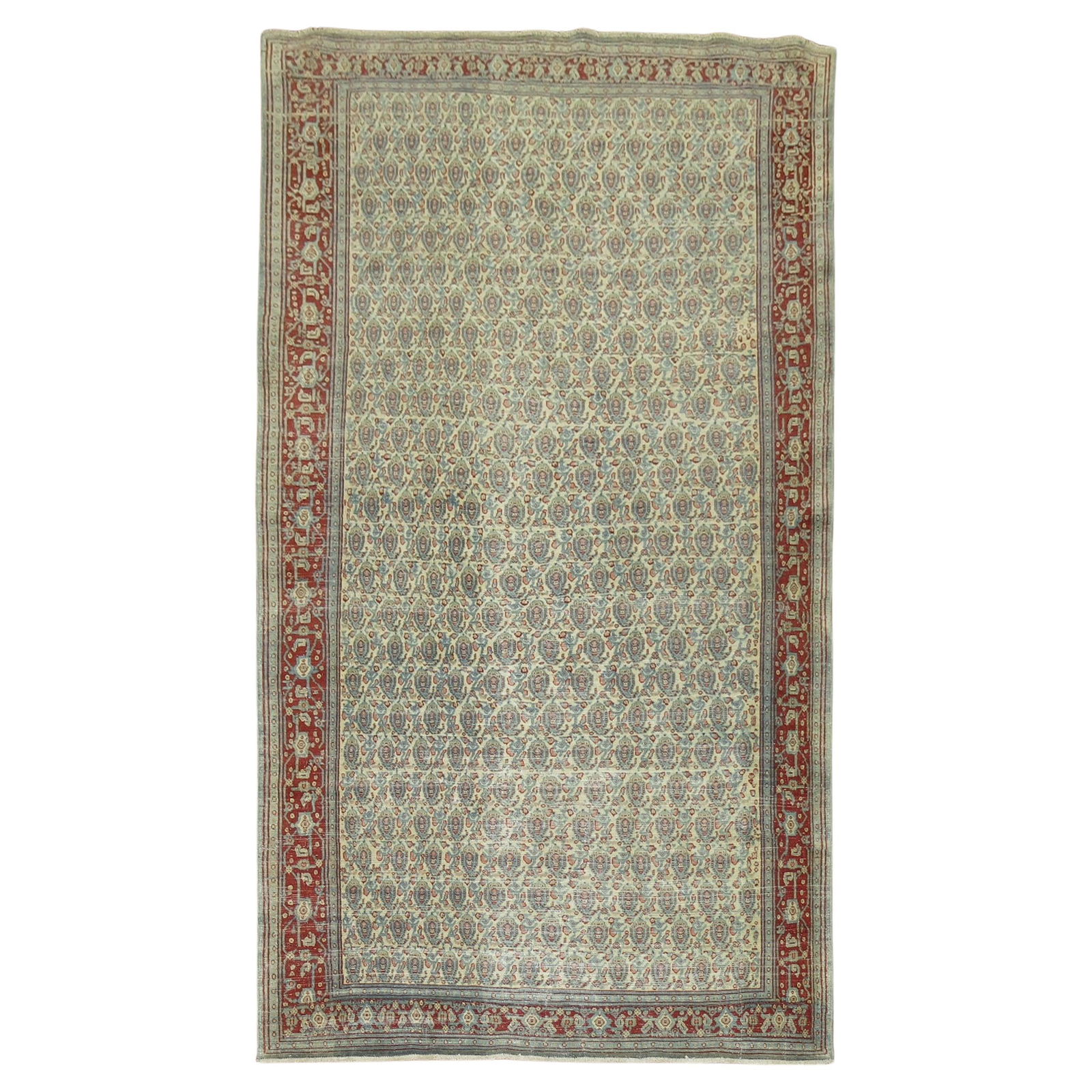Persian Tabriz Paisley Wool Rug Early 20th Century 57 x 94: Persian Tabriz Paisley Wool Rug Early 20th Century 57 x 94 This exquisite Persian Tabriz rug from the early 20th century showcases a charming repetitive small paisley design set against a light-colore