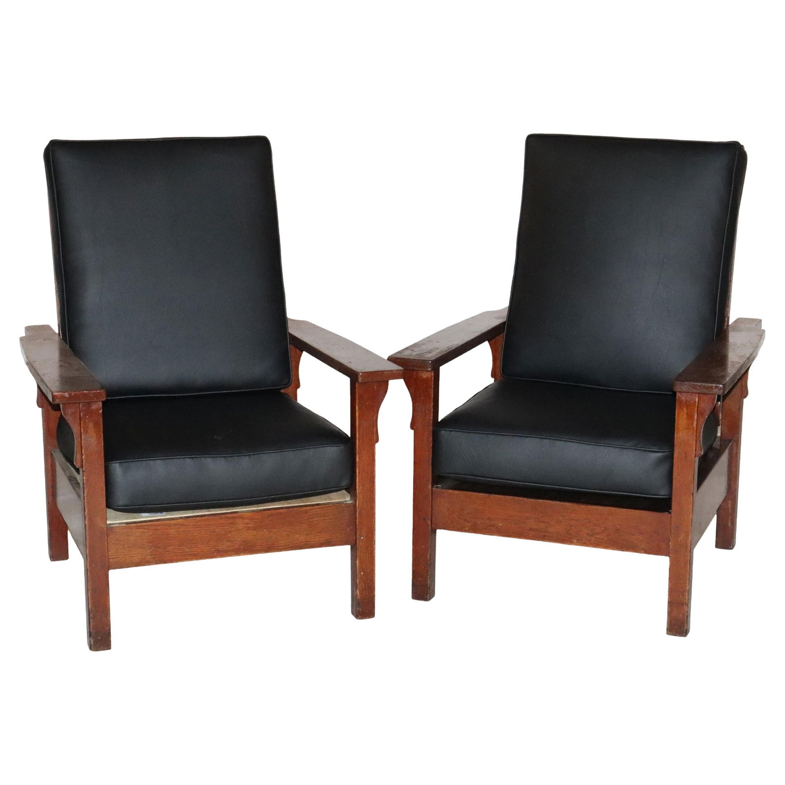 Signed Pair of Antique Gustav Stickley Mission Oak Morris Chairs c1910: Signed Pair of Antique Gustav Stickley Mission Oak Morris Chairs c1910 This exquisite pair of antique Gustav Stickley Arts and Crafts Mission Oak Morris chairs, dating back to circa 1910, exemplifies