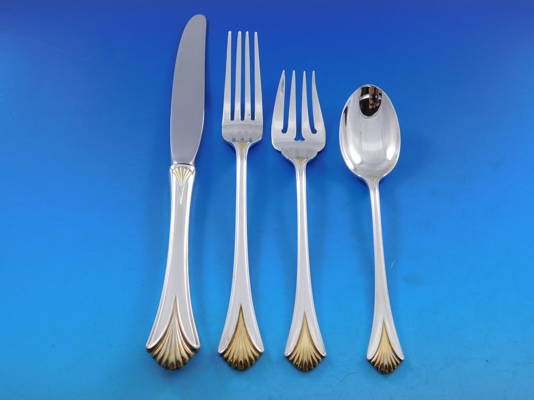 Lunt Regency Shell Golden Sterling Silver Flatware Set for 8 38 pcs: Lunt Regency Shell Golden Sterling Silver Flatware Set for 8 38 pcs Elevate your dining experience with the stunning Regency Shell Golden flatware set by Lunt, crafted from high-quality sterling silve