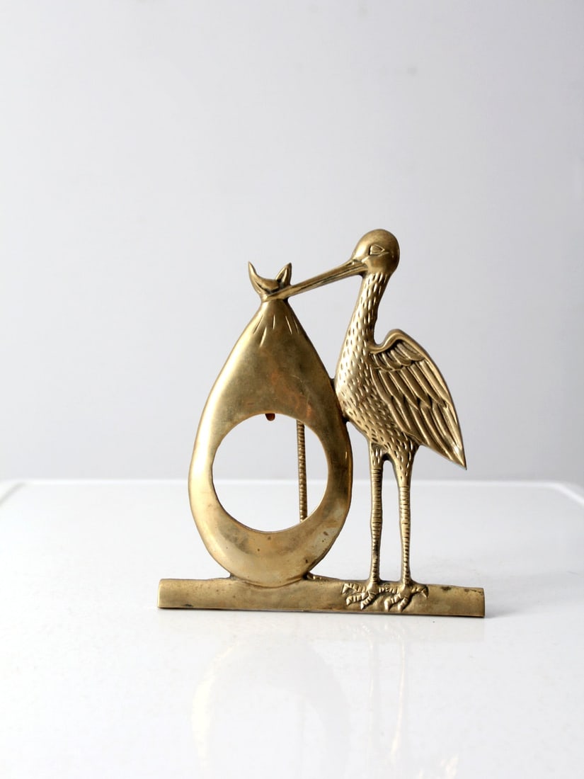 Mid Century Brass Stork Frame 3x3 Photo Display Nursery Decor: Mid Century Brass Stork Frame 3x3 Photo Display Nursery Decor This charming mid-century brass picture frame features an easel style design with a delightful stork holding a bundle to display your cher