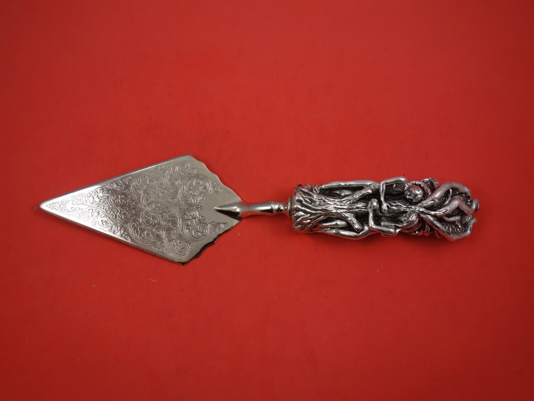 Yaakov Heller Adam and Eve Sterling Silver Cake Knife 12.5": Yaakov Heller Adam and Eve Sterling Silver Cake Knife 12.5" This exquisite cake knife features a stunning Sterling Silver handle designed in the 'Adam and Eve' pattern by renowned maker Yaakov Heller.