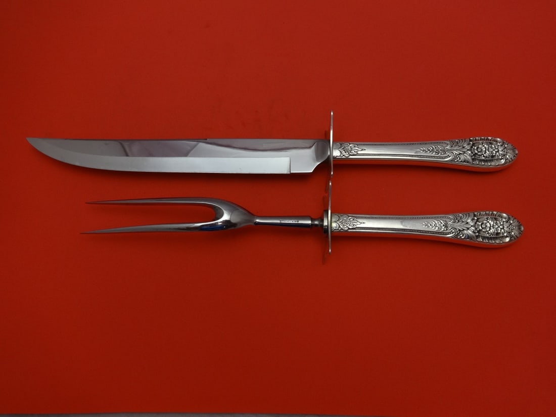 Crown Princess 2pc Sterling Silver Carving Set by International: Crown Princess 2pc Sterling Silver Carving Set by International Elevate your dining experience with the Crown Princess Roast Carving Set by International. This exquisite 2-piece set features a sterlin