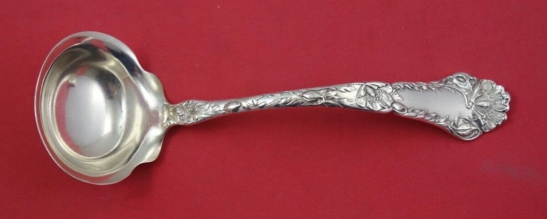 Gorham Poppy Sterling Silver Gravy Ladle 7.25 inches: Gorham Poppy Sterling Silver Gravy Ladle 7.25 inches This exquisite gravy ladle is a stunning piece from the renowned Gorham brand, crafted in sterling silver. The ladle features the elegant 'Poppy' p