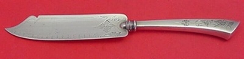 Gorham Angelo Sterling Silver Bright-Cut Cake Knife 8": Gorham Angelo Sterling Silver Bright-Cut Cake Knife 8" This exquisite Angelo by Gorham cake knife features a bright-cut design with a hollow handle, showcasing the craftsmanship of the renowned Gorham