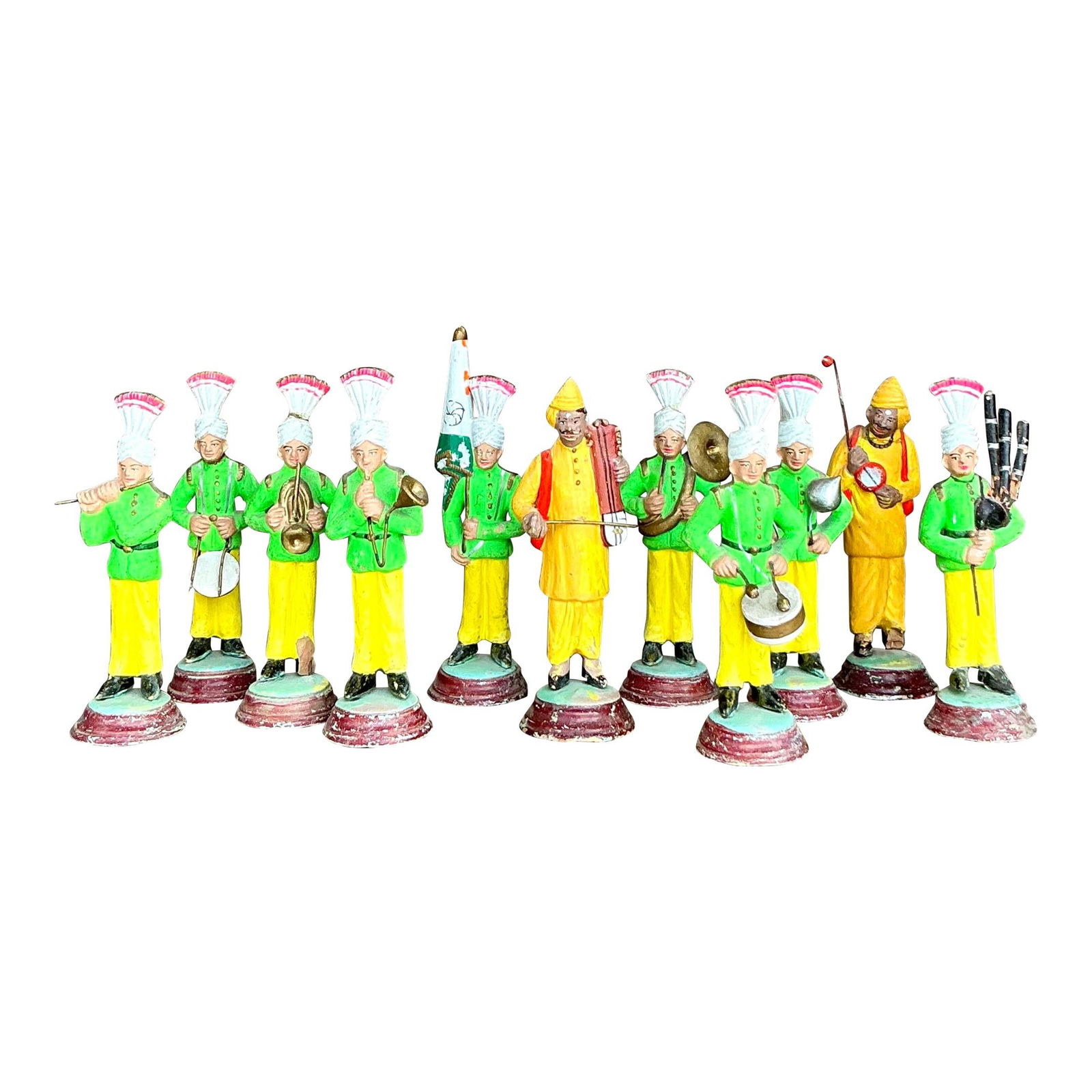 Vintage Hand Painted Terra Cotta Marching Band Set of 11 Figures: Vintage Hand Painted Terra Cotta Marching Band Set of 11 Figures This delightful vintage hand-painted terra cotta marching band set includes 11 vibrant figures, each dressed in striking green jackets