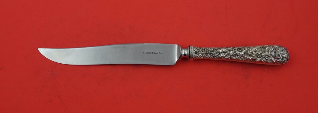 Kirk Repousse Sterling Silver Steak Carving Knife 9 5/8": Kirk Repousse Sterling Silver Steak Carving Knife 9 5/8" This exquisite steak carving knife features the renowned Repousse pattern by Kirk, crafted from high-quality sterling silver. The intricate flo