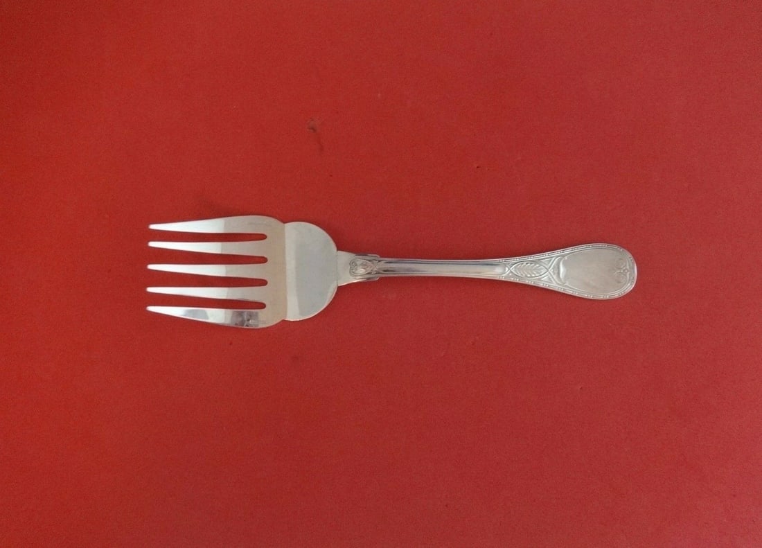 Christofle Brienne Sterling Silver 5-Tine Fish Serving Fork 8 3/4": Christofle Brienne Sterling Silver 5-Tine Fish Serving Fork 8 3/4" Elevate your dining experience with this exquisite fish serving fork from Christofle's Brienne pattern. Crafted from high-quality ste