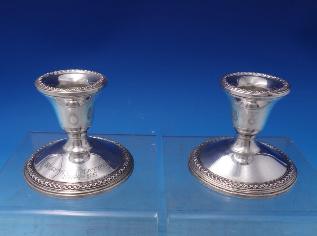 Wedding Bells Sterling Silver Candlestick Pair Engraved 1954-55: Wedding Bells Sterling Silver Candlestick Pair Engraved 1954-55 This exquisite pair of candlesticks from the Wedding Bells collection by International Sterling features a beautiful engraving that read