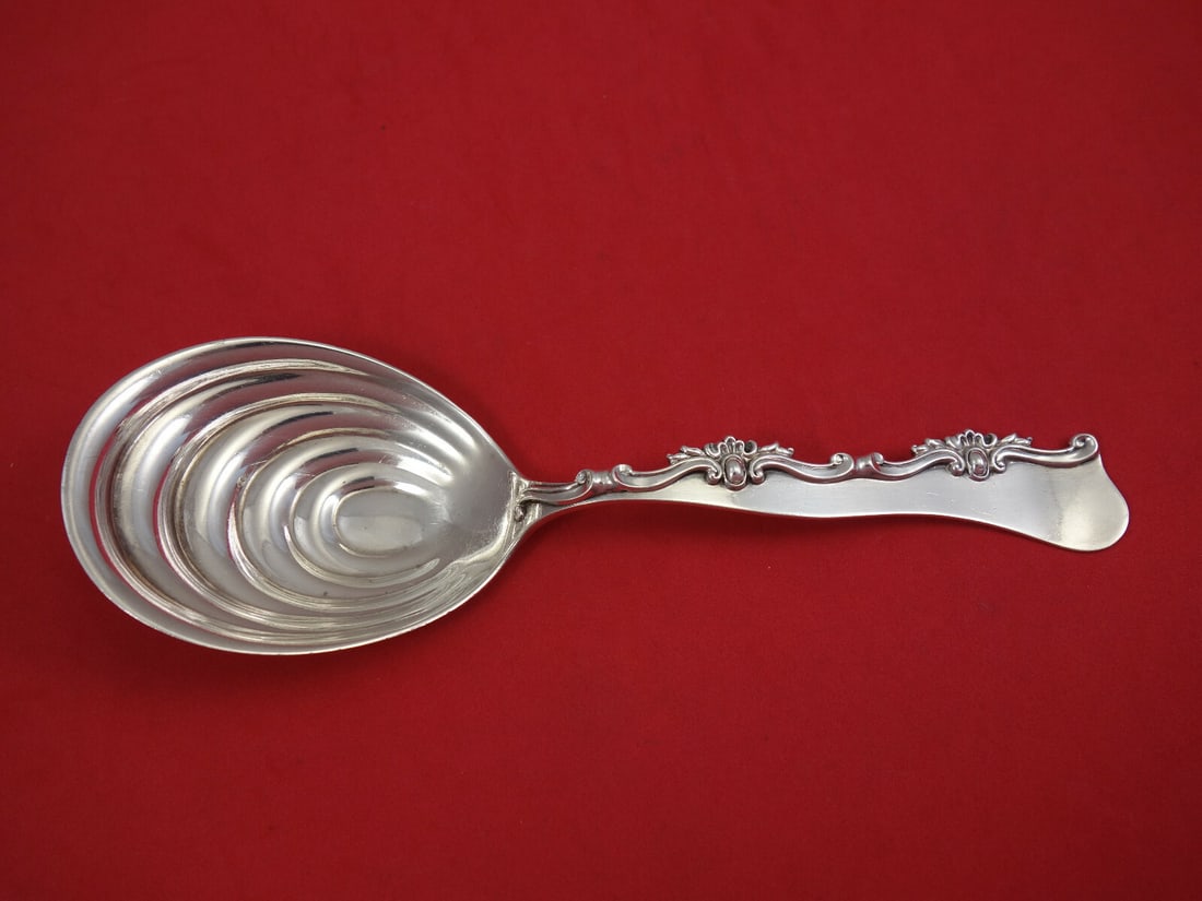 Shiebler Sterling Silver Berry Spoon Shell Bowl 8.25 Inch Serving: Shiebler Sterling Silver Berry Spoon Shell Bowl 8.25 Inch Serving This exquisite Shiebler berry spoon features a beautifully designed shell bowl, crafted from high-quality sterling silver. Measuring 8