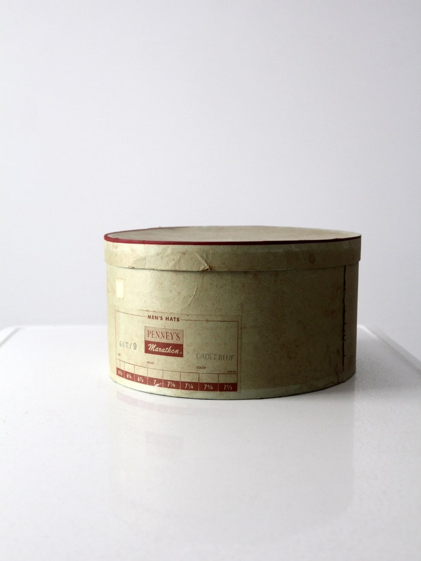 Vintage 1950s Penney's Marathon Olive Green Hat Box: Vintage 1950s Penney's Marathon Olive Green Hat Box This vintage 1950s hat box is the perfect storage solution for your Penney's Marathon men's hat. Crafted from olive green paper board, it features e