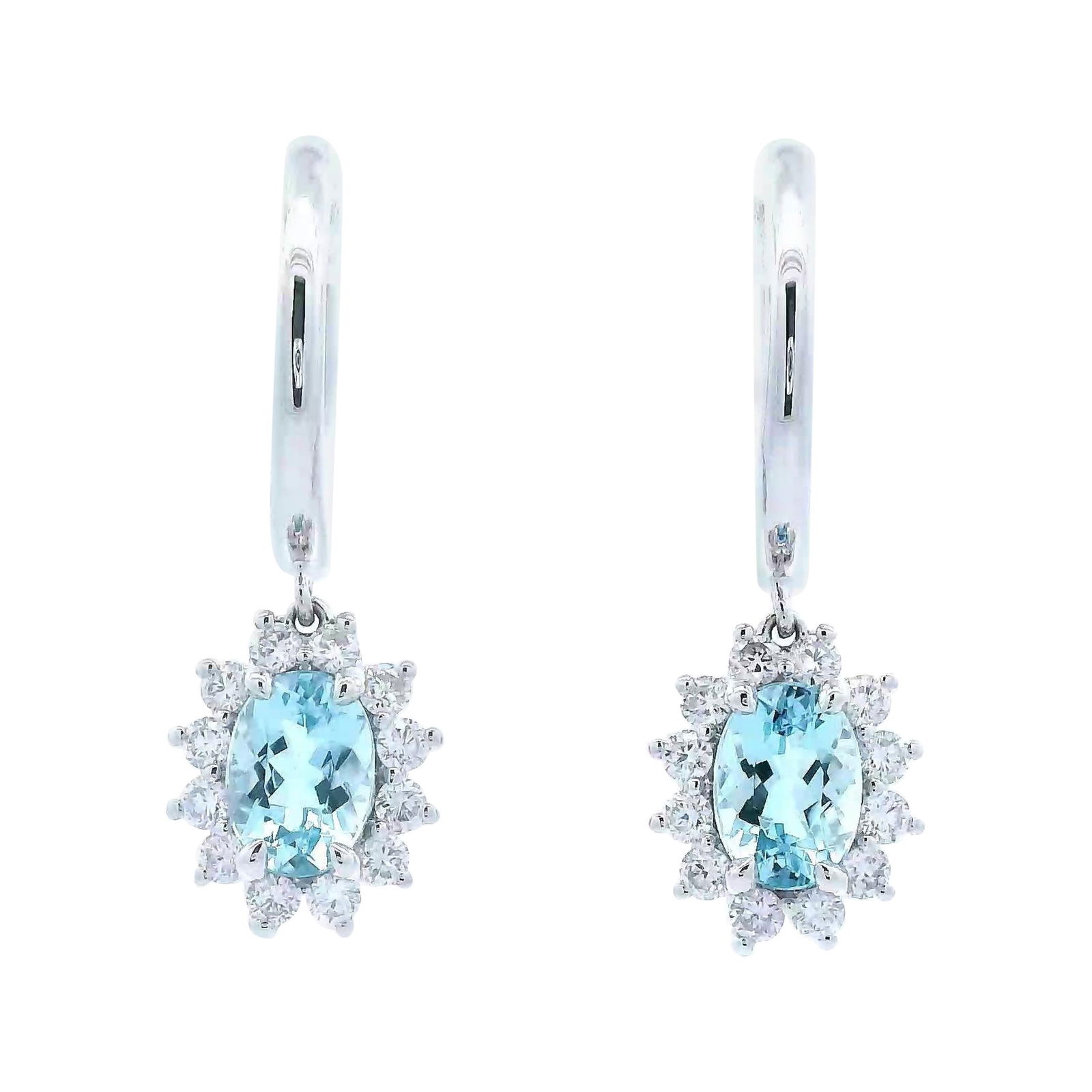 14k White Gold 2.23ct Aquamarine Diamond Drop Earrings: 14k White Gold 2.23ct Aquamarine Diamond Drop Earrings Elevate your style with these stunning 2.23ctt oval aquamarine and diamond earrings, crafted from 14k white gold. These contemporary drop earring