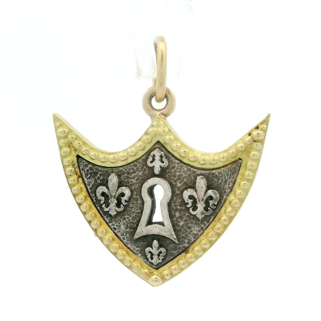 Erica Molinari 18k Yellow Gold Silver Fleur De Lis Pendant: Erica Molinari 18k Yellow Gold Silver Fleur De Lis Pendant This exquisite pendant features a Fleur De Lis design, crafted from 18k solid yellow gold with a silver center. The pendant measures approxim