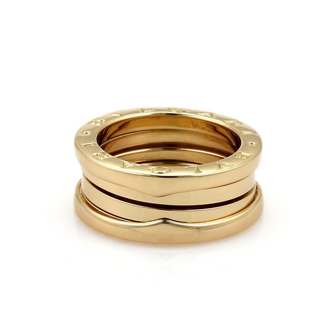 Bvlgari B Zero-1 18k Yellow Gold 8.5mm Band Ring Size 51 US 5: Bvlgari B Zero-1 18k Yellow Gold 8.5mm Band Ring Size 51 US 5 Discover this authentic Bvlgari B Zero-1 ring, an exquisite piece finely crafted from 18k yellow gold. This stunning band showcases a comf