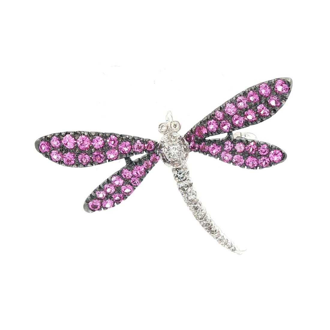 18k White Gold Diamond Dragonfly Brooch with Pink Sapphire Wings: 18k White Gold Diamond Dragonfly Brooch with Pink Sapphire Wings This stunning brooch features an exquisite design of a dragonfly crafted in 18k white gold, accentuated by vibrant pink sapphire wings.