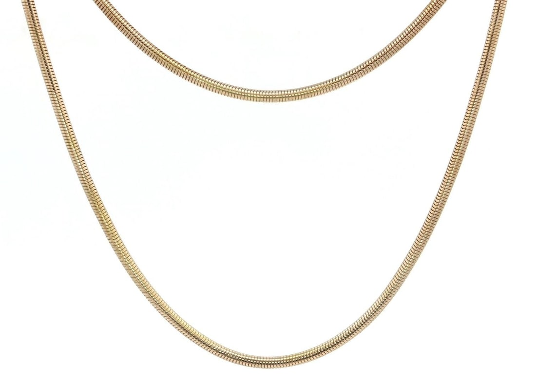 14k Yellow Gold 20 Inch 1.7mm Snake Link Chain Necklace: 14k Yellow Gold 20 Inch 1.7mm Snake Link Chain Necklace This elegant necklace features a 20-inch chain crafted from solid 14k yellow gold, showcasing a refined rounded snake link design. Weighing 10.8