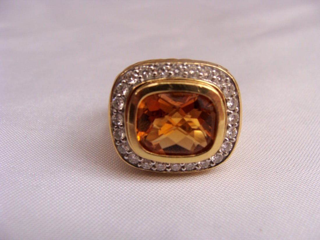David Yurman 18K Yellow Gold Citrine Diamond Ring Size 5-7: David Yurman 18K Yellow Gold Citrine Diamond Ring Size 5-7 This stunning ring showcases a vibrant citrine center stone, measuring 12 x 11 x 7 mm, set in luxurious 18K yellow gold. Adorned with 0.8 car