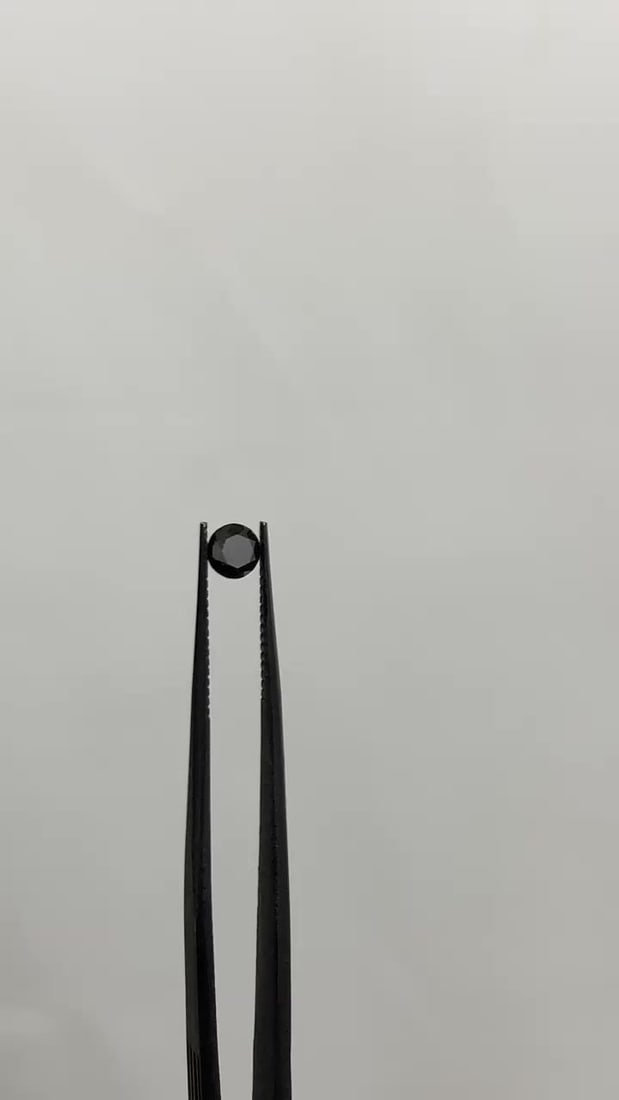 Loose Diamond - ROUND 0.52ct Fancy Black VVS2: Loose Diamond - ROUND 0.52ct Fancy Black VVS2 Source: Natural Shape: ROUND Carats: 0.52 Color: Fancy Black Certification: GIA Video: