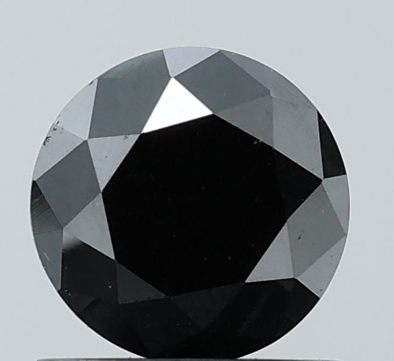 Loose Diamond - ROUND 0.91ct Fancy Black VS2: Loose Diamond - ROUND 0.91ct Fancy Black VS2 Source: Natural Shape: ROUND Carats: 0.91 Color: Fancy Black Certification: NONE Video: