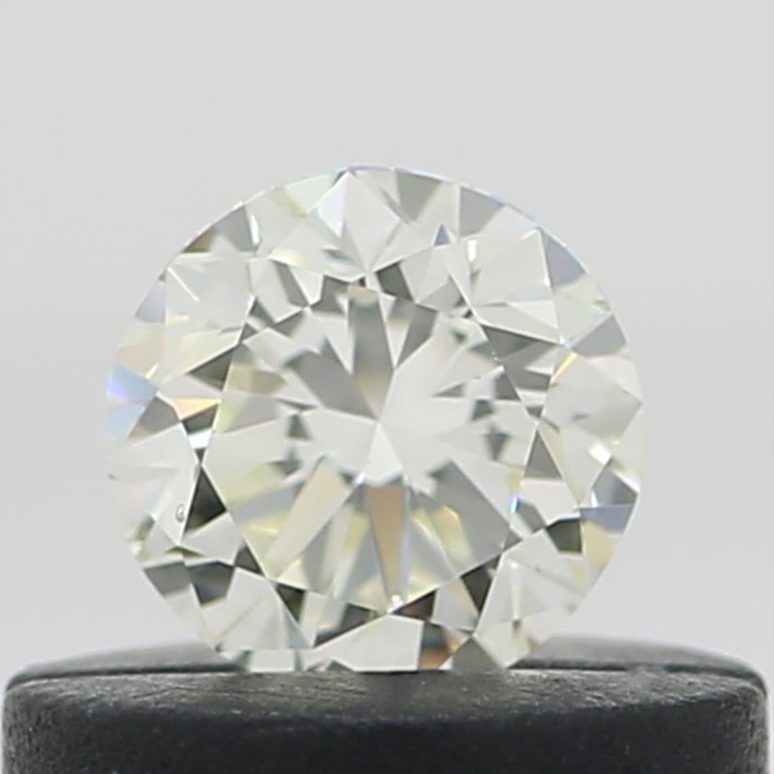Loose Diamond - ROUND 0.31ct O-P VS2: Loose Diamond - ROUND 0.31ct O-P VS2 Source: Natural Shape: ROUND Carats: 0.31 Color: O-P Certification: NONE Video: