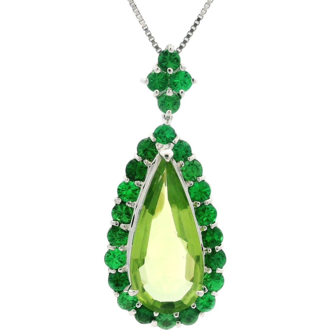 18k White Gold GIA Certified 8.3ct Green Peridot Tsavorite Teardrop Pendant Necklace: 18k White Gold GIA Certified 8.3ct Green Peridot Tsavorite Teardrop Pendant Necklace This stunning pendant necklace features a large teardrop-shaped natural peridot, weighing 5.46 carats, set in a hal