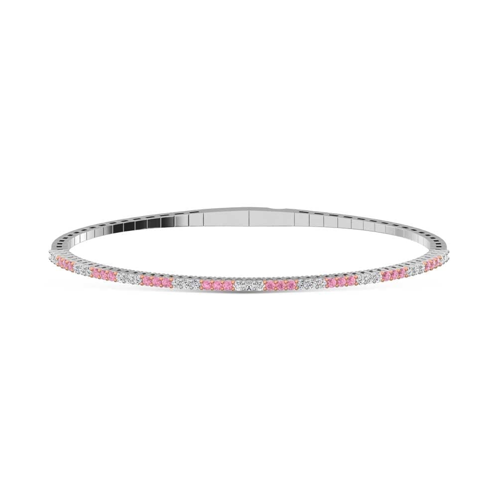 14K White Gold 1 Ct.Tw. Alternate 3 white and 3 Pink Lab Grown Diamond Bangle: 14K White Gold 1 Ct.Tw. Alternate 3 white and 3 Pink Lab Grown Diamond Bangle Designed in 14K White Gold, this bangle showcases alternate 3 white and 3 pink lab grown diamonds totaling 1 Ct.Tw., deliv