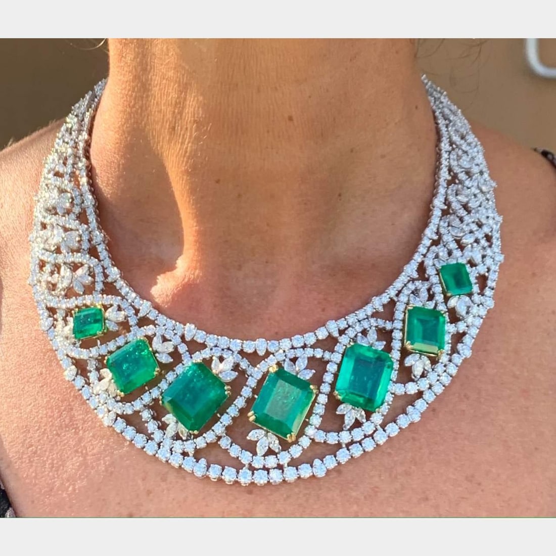 AGL Certified Emerald Diamond Necklace in 18K White Gold: AGL Certified Emerald Diamond Necklace in 18K White Gold This exquisite necklace features an intricate design in 18K white gold, showcasing AGL Certified Colombian emeralds and diamonds. The necklace