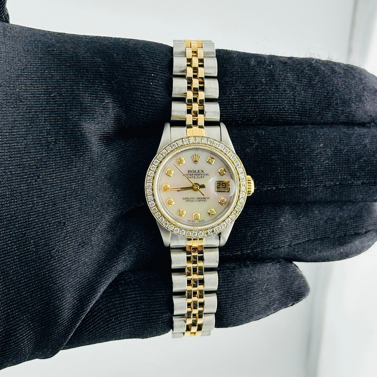 Ladies Datejust 69173 Aftermarket White MOP Diamond Dial Jubilee Watch: Ladies Datejust 69173 Aftermarket White MOP Diamond Dial Jubilee Watch This ladies Rolex Datejust watch features an aftermarket white mother-of-pearl dial set with diamonds. The timepiece is fitted wi