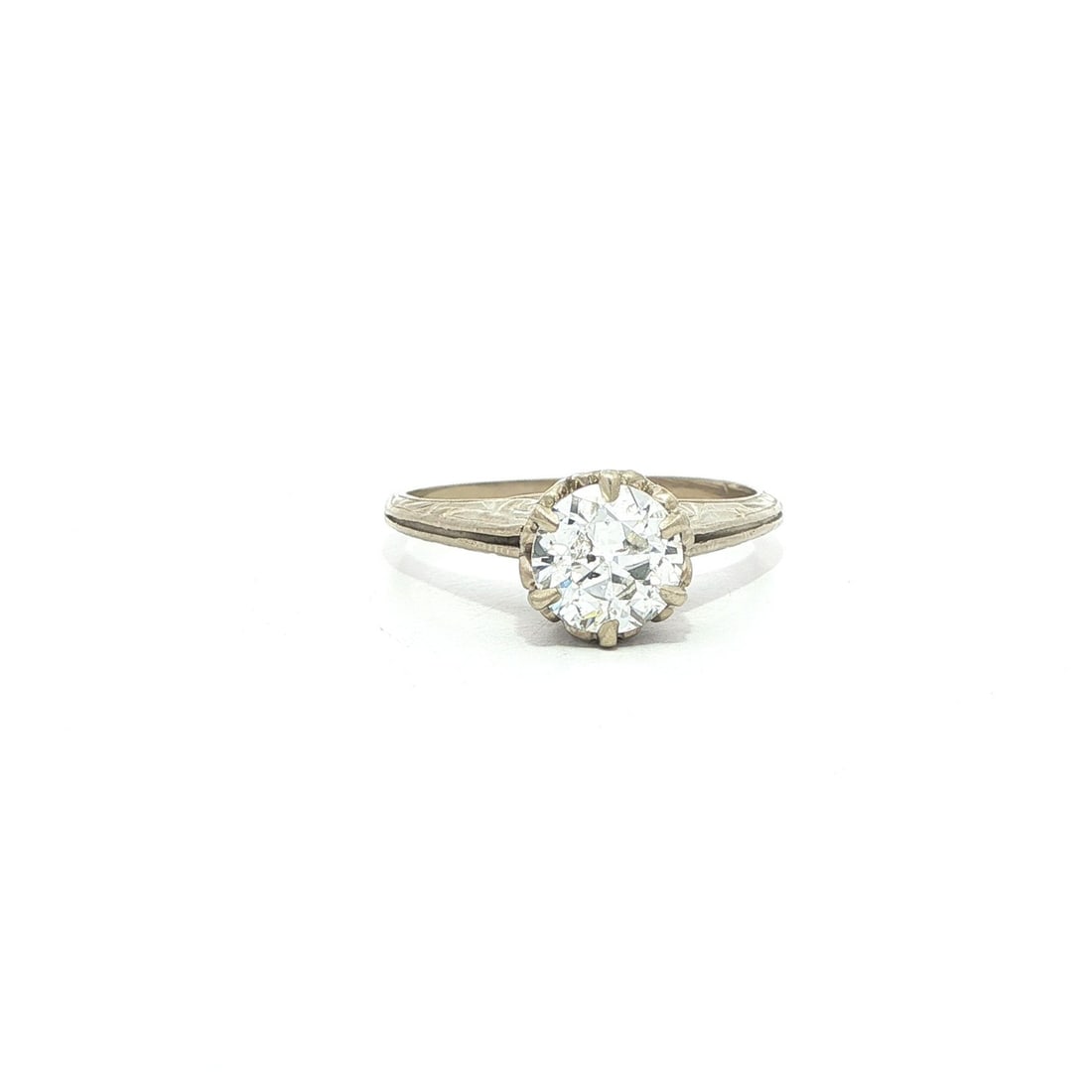 Antique Art Deco .81ct Old European Diamond White Gold Engagement Ring: Antique Art Deco .81ct Old European Diamond White Gold Engagement Ring This exquisite Antique Art Deco engagement ring showcases a stunning .81ct Old European Cut diamond, known for its fiery brillian