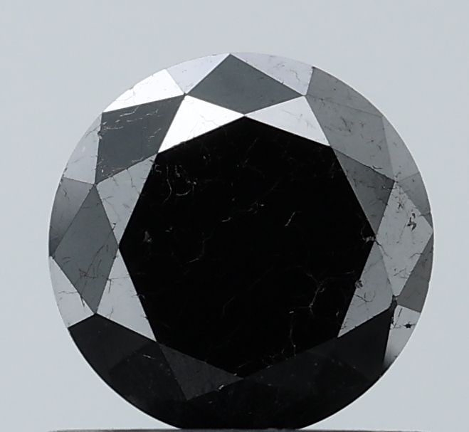 Loose Diamond - ROUND 0.89ct Fancy Black VS2: Loose Diamond - ROUND 0.89ct Fancy Black VS2 Source: Natural Shape: ROUND Carats: 0.89 Color: Fancy Black Certification: NONE Video: