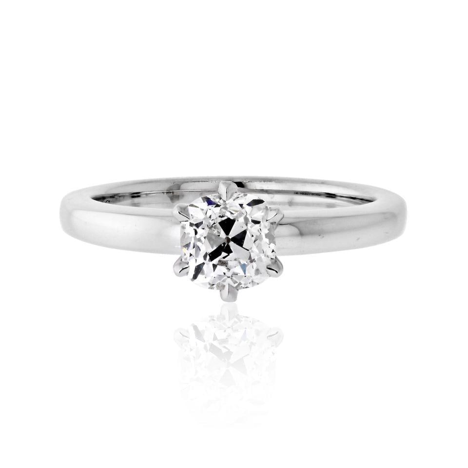1.06 Carat Old Mine Cut Diamond GIA Engagement Ring in 14K White Gold: 1.06 Carat Old Mine Cut Diamond GIA Engagement Ring in 14K White Gold This exquisite solitaire engagement ring beautifully blends modern and vintage styles. It features a stunning 1.06 carat Old Mine