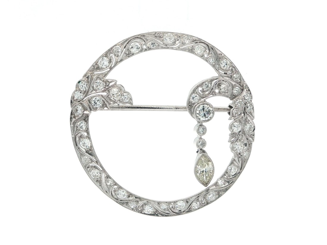 Art Deco Platinum and 14k White Gold Diamond Wreath Dangle Brooch Circa 1920s: Art Deco Platinum and 14k White Gold Diamond Wreath Dangle Brooch Circa 1920s This antique Art Deco brooch features a dangle wreath design set with numerous natural, genuine diamonds, including old Eu
