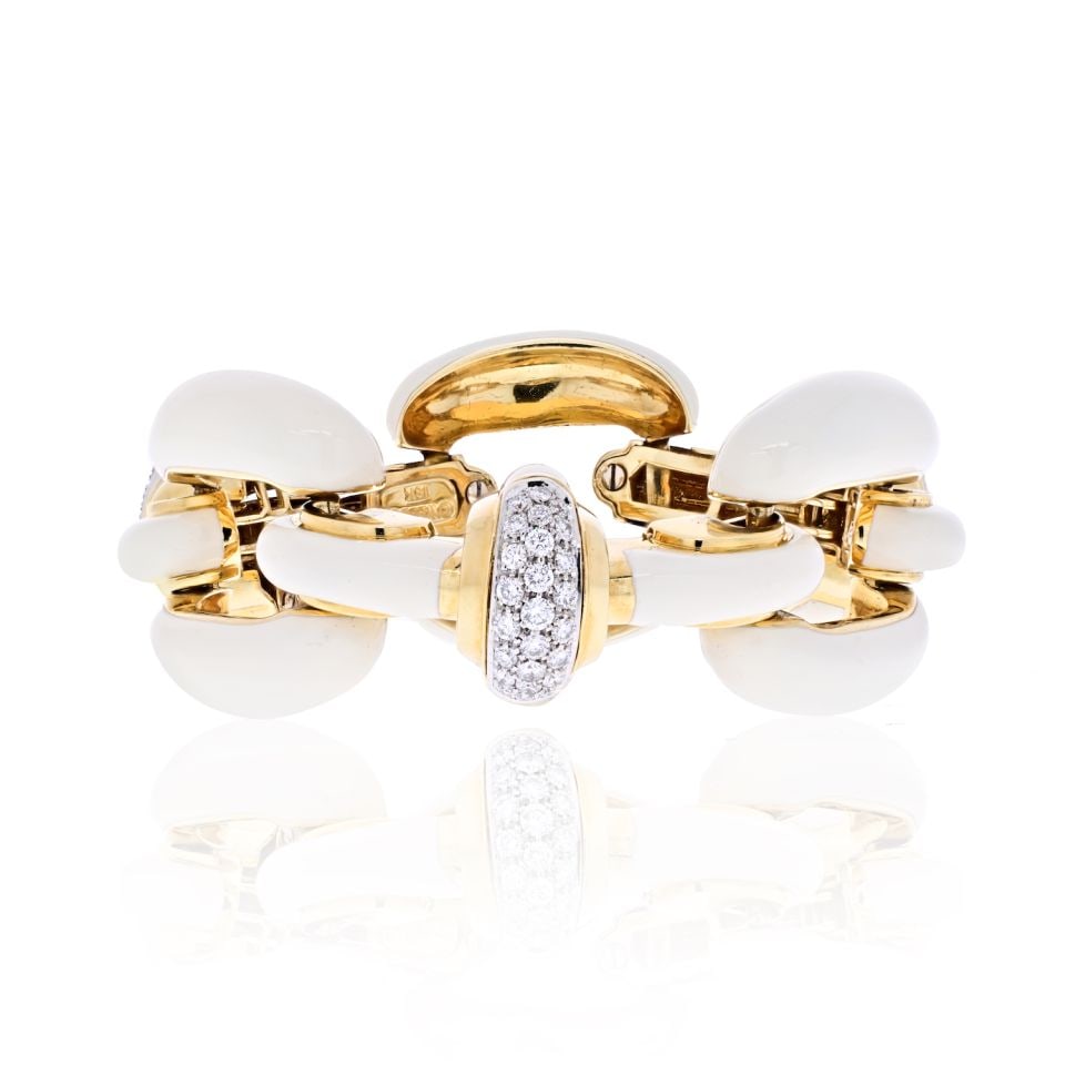 David Webb 1975 Platinum 18K Yellow Gold Diamond Enamel Bracelet: David Webb 1975 Platinum 18K Yellow Gold Diamond Enamel Bracelet This exquisite bracelet showcases a timeless design by David Webb, featuring a captivating combination of platinum and 18K yellow gold.