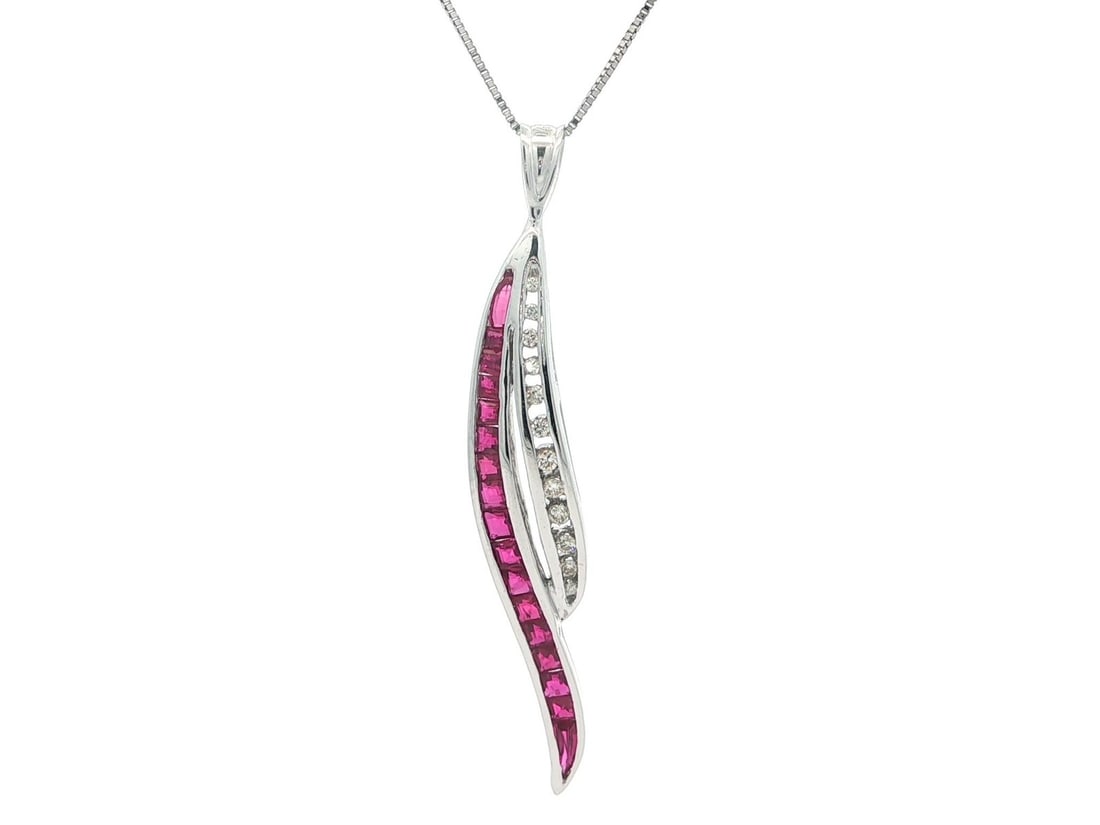 14k White Gold 0.83ctw Diamond Ruby Wavy Feather Pendant Necklace 20": 14k White Gold 0.83ctw Diamond Ruby Wavy Feather Pendant Necklace 20" This exquisite necklace features a captivating wavy feather pendant crafted from solid 14k white gold, complemented by an 18k whit