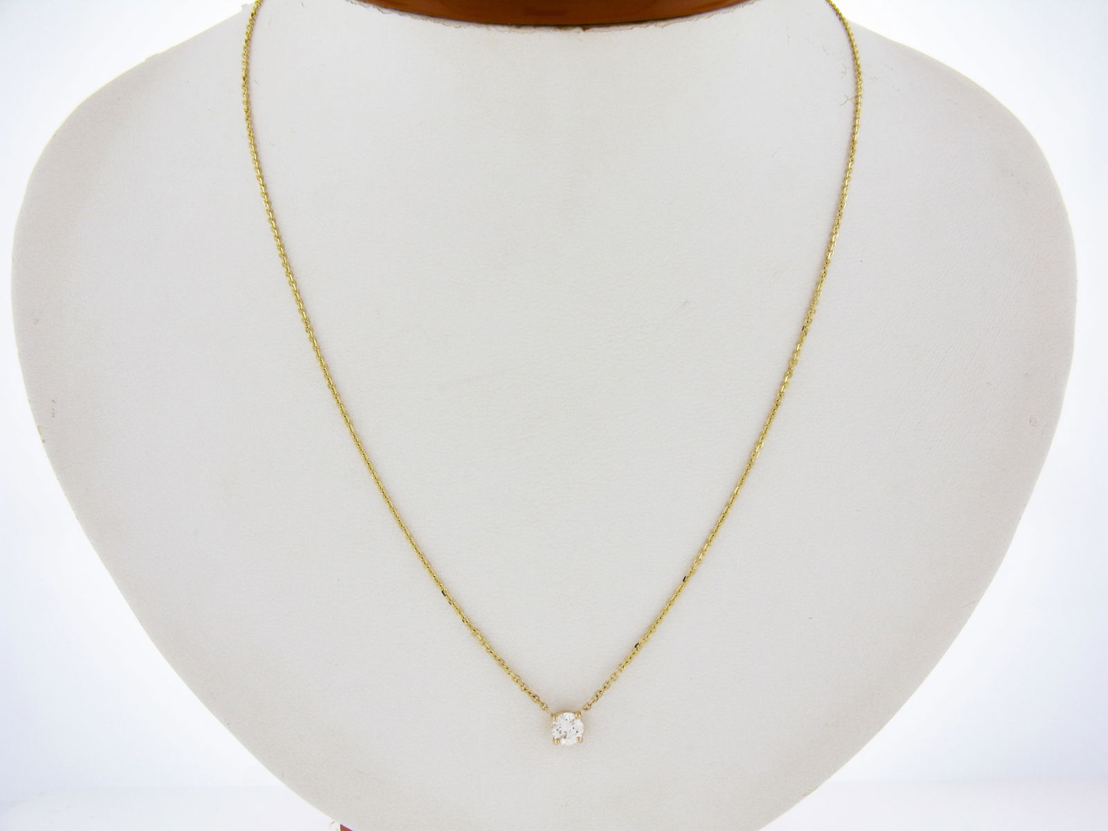 14K Yellow Gold 0.49ct Diamond Solitaire Pendant Necklace Adjustable Chain: 14K Yellow Gold 0.49ct Diamond Solitaire Pendant Necklace Adjustable Chain This elegant necklace features a stunning solitaire pendant crafted from solid 14K yellow gold. The pendant showcases a round