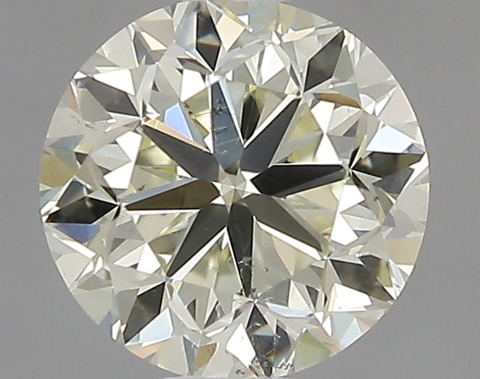 Loose Diamond - ROUND 0.7ct O-P SI2: Loose Diamond - ROUND 0.7ct O-P SI2 Source: Natural Shape: ROUND Carats: 0.7 Color: O-P Certification: GIA Video: