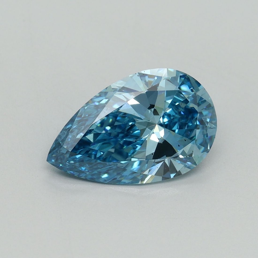 Loose Diamond - PEAR 2.05ct Fancy Vivid Blue VS2: Loose Diamond - PEAR 2.05ct Fancy Vivid Blue VS2 Source: This is a real non-mined Diamond that has been grown in a lab Shape: PEAR Carats: 2.05 Color: Fancy Vivid Blue Certification: IGI Video: