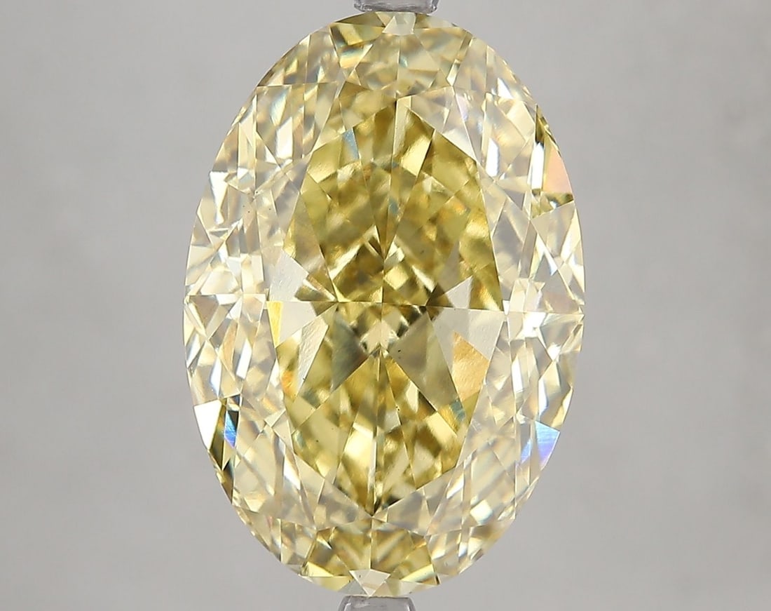 Loose Diamond - OVAL 9.04ct Fancy Intense Yellow VS1: Loose Diamond - OVAL 9.04ct Fancy Intense Yellow VS1 Source: This is a real non-mined Diamond that has been grown in a lab Shape: OVAL Carats: 9.04 Color: Fancy Intense Yellow Certification: IGI Video