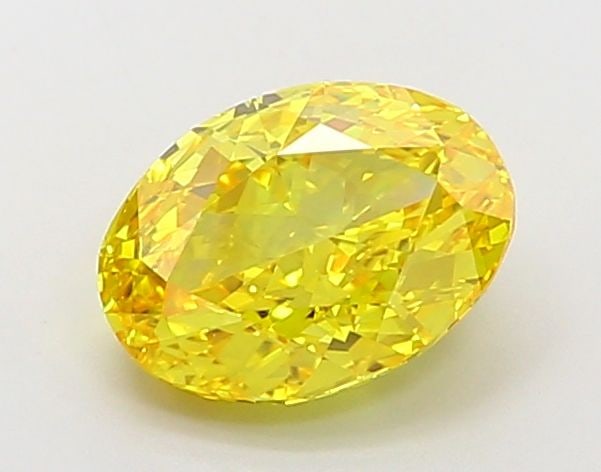 Loose Diamond - OVAL 2.01ct Fancy Vivid Yellow VVS2: Loose Diamond - OVAL 2.01ct Fancy Vivid Yellow VVS2 Source: This is a real non-mined Diamond that has been grown in a lab Shape: OVAL Carats: 2.01 Color: Fancy Vivid Yellow Certification: IGI Video: