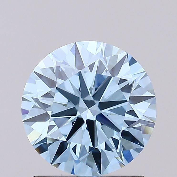Loose Diamond - ROUND 1.29ct Fancy Vivid Blue VS1: Loose Diamond - ROUND 1.29ct Fancy Vivid Blue VS1 Source: This is a real non-mined Diamond that has been grown in a lab Shape: ROUND Carats: 1.29 Color: Fancy Vivid Blue Certification: IGI Video: