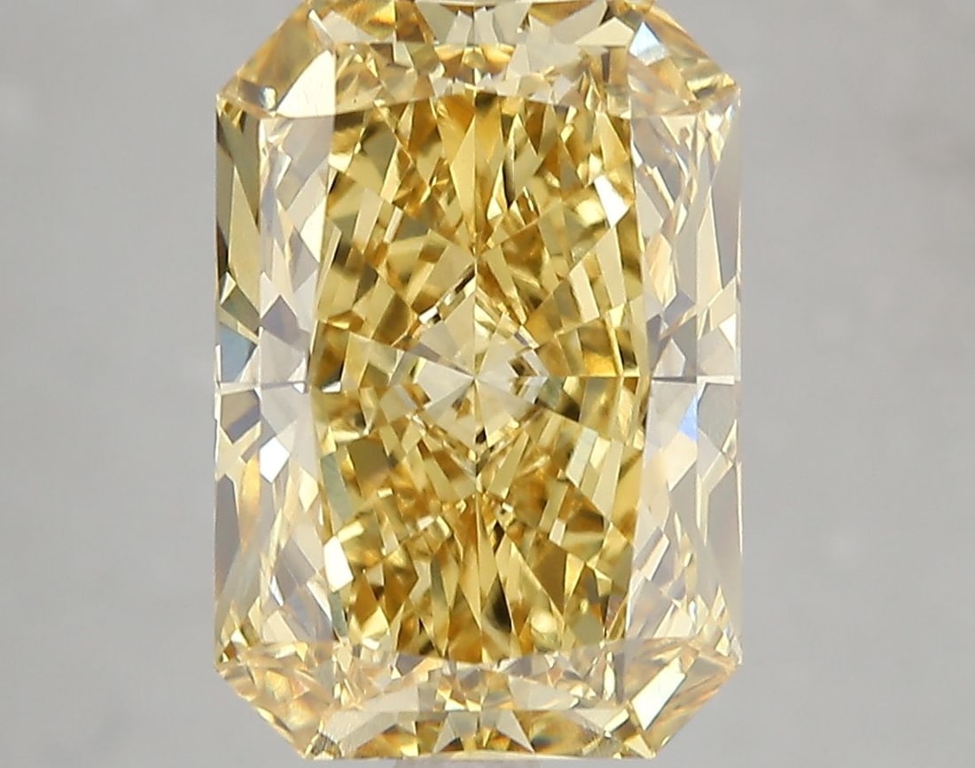 Loose Diamond - RADIANT 5.2ct Fancy Vivid Yellow VS1: Loose Diamond - RADIANT 5.2ct Fancy Vivid Yellow VS1 Source: This is a real non-mined Diamond that has been grown in a lab Shape: RADIANT Carats: 5.2 Color: Fancy Vivid Yellow Certification: IGI Video