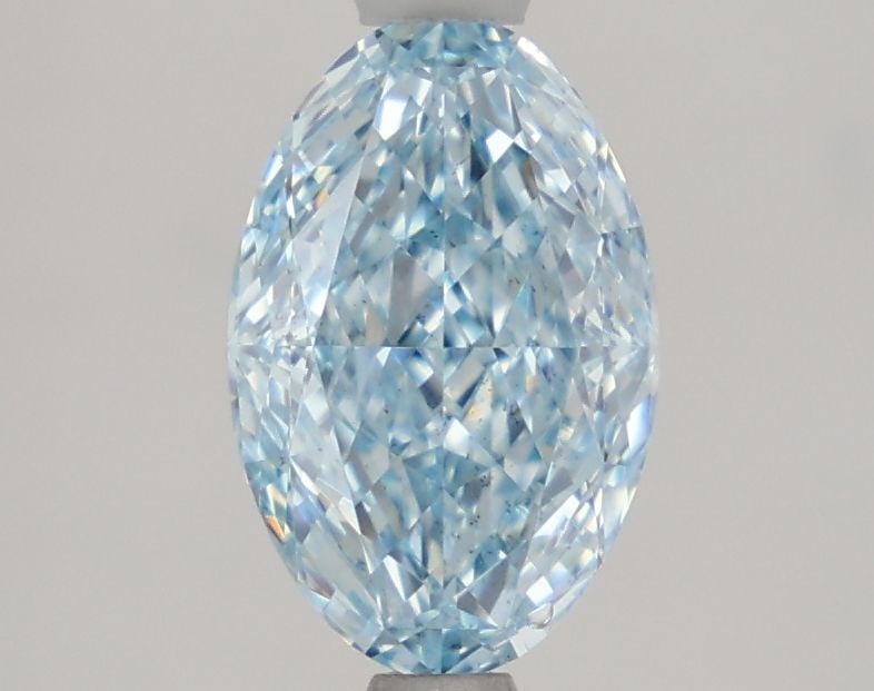 Loose Diamond - OVAL 1.59ct Fancy Vivid Blue VS2: Loose Diamond - OVAL 1.59ct Fancy Vivid Blue VS2 Source: This is a real non-mined Diamond that has been grown in a lab Shape: OVAL Carats: 1.59 Color: Fancy Vivid Blue Certification: IGI Video:
