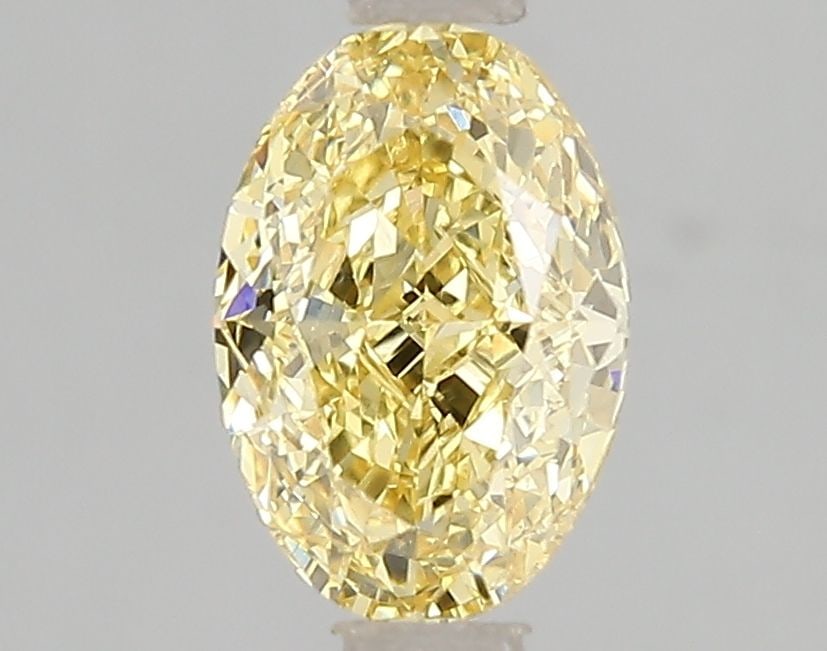 Loose Diamond - OVAL 3.02ct Fancy Vivid Yellow VS1: Loose Diamond - OVAL 3.02ct Fancy Vivid Yellow VS1 Source: This is a real non-mined Diamond that has been grown in a lab Shape: OVAL Carats: 3.02 Color: Fancy Vivid Yellow Certification: IGI Video: