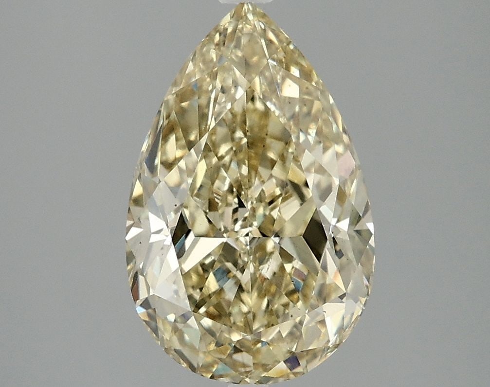Loose Diamond - PEAR 3.04ct Fancy Vivid Yellow VS2: Loose Diamond - PEAR 3.04ct Fancy Vivid Yellow VS2 Source: This is a real non-mined Diamond that has been grown in a lab Shape: PEAR Carats: 3.04 Color: Fancy Vivid Yellow Certification: IGI Video: