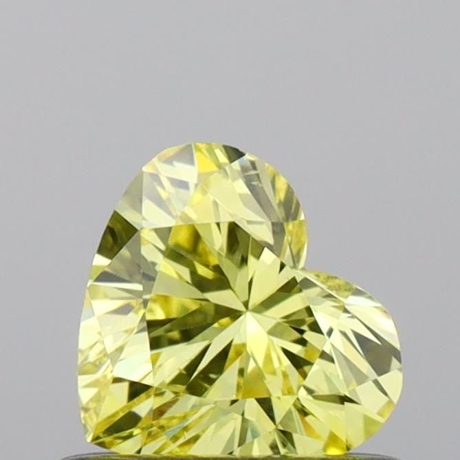 Loose Diamond - HEART 0.49ct Fancy Vivid Yellow VS2: Loose Diamond - HEART 0.49ct Fancy Vivid Yellow VS2 Source: This is a real non-mined Diamond that has been grown in a lab Shape: HEART Carats: 0.49 Color: Fancy Vivid Yellow Certification: IGI Video: